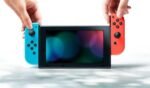 Nintendo Switch-Konsole mit zwei kabellosen Joy-Con-Controllern in Rot und Neonblau V3 – Bild 4