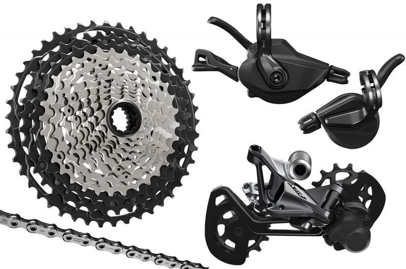 Shimano_XTR-M9100-2x12-fach-Upgrade-Kit-10-45-Schelle-ohne-Umwerfer_20067303_800x800-00.jpg Shimano XTR M9100 2×12-fach Upgrade-Kit 10-45 Schelle – Bild 1